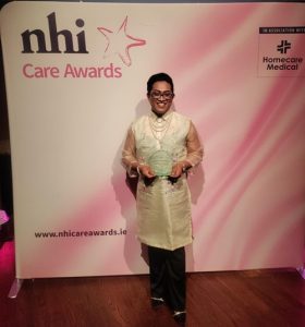 Winner of the Nursing Homes Ireland Care Award 2023, Ferdinand from Foxrock Nursing Home showcases his award.